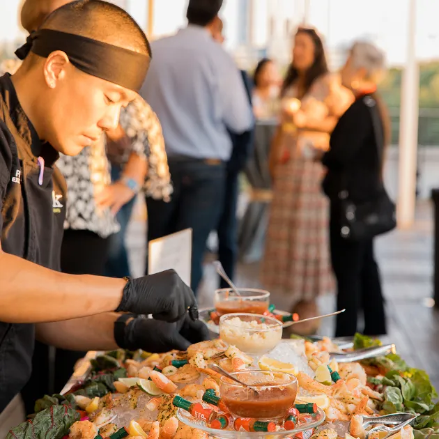 Chef preparing food for a private event