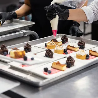 Desserts being decorated